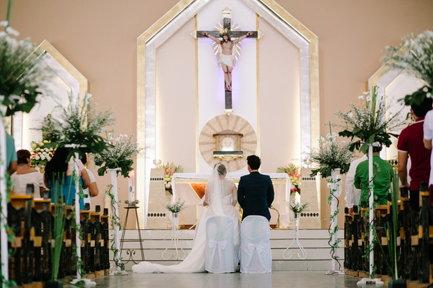 Newlywed Couple in Church Wedding