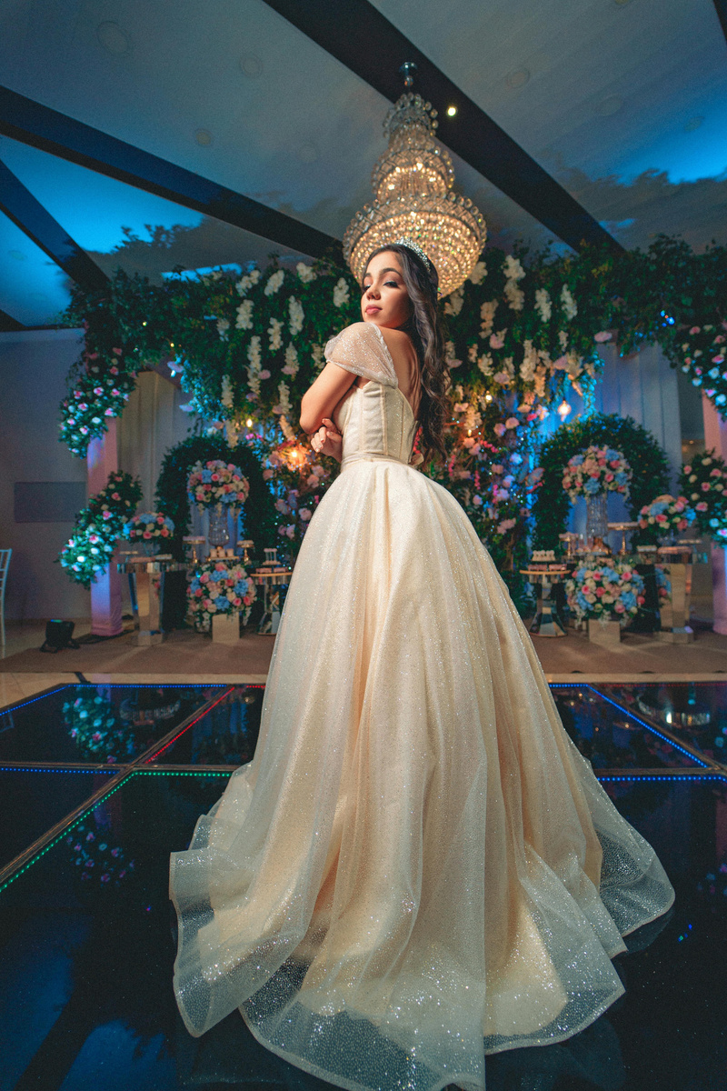 A Quinceañera Posing at her Birthday Party